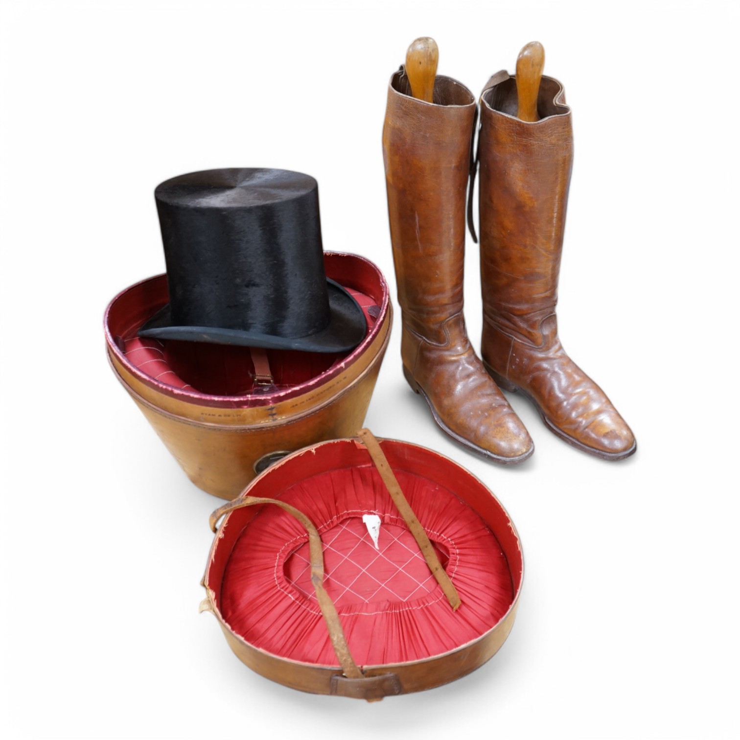 A pair of vintage leather riding boots and a leather cased top hat, ‘A.J. White, hatter to the Royal Family’. Condition - fair
